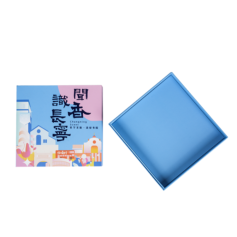 Holiday-themed hard book-shaped rotating music box