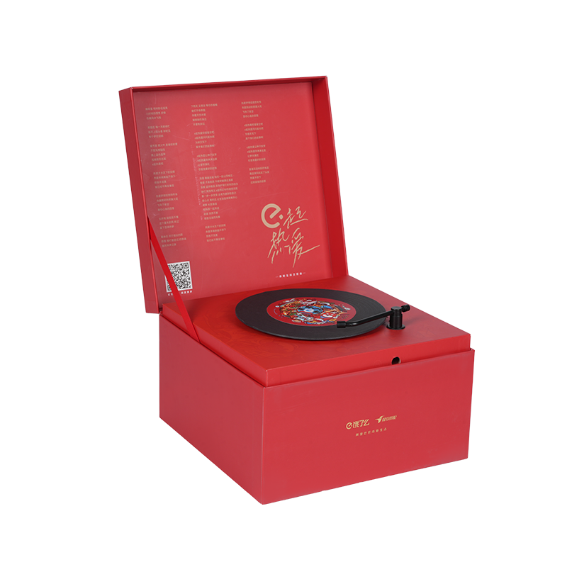 Holiday-themed hard book-shaped rotating music box